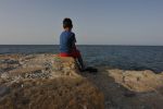 Cyprus - young boy and the sea